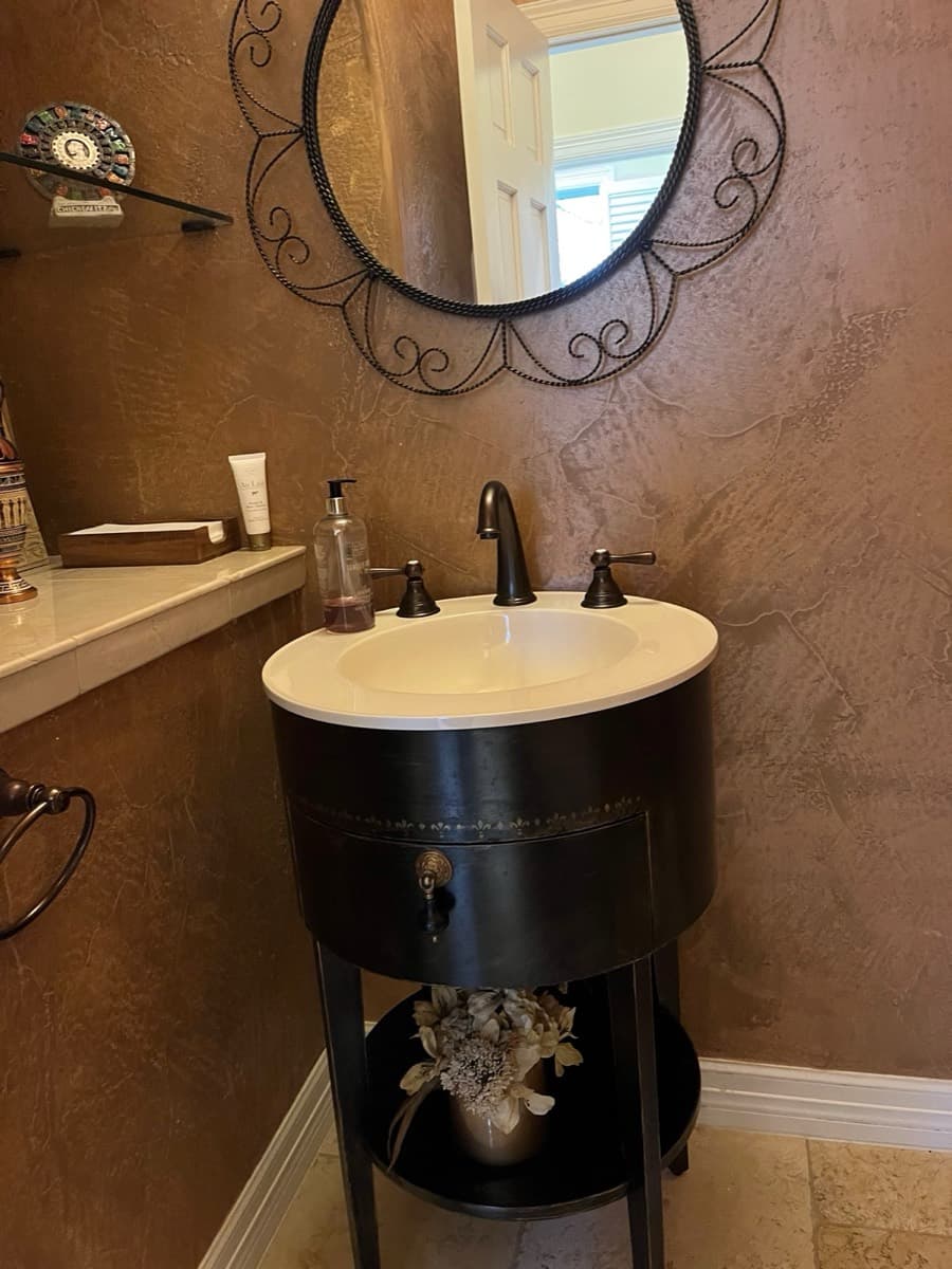 Sculptural black bathroom sink cleaning showcase - The Fresh Finish